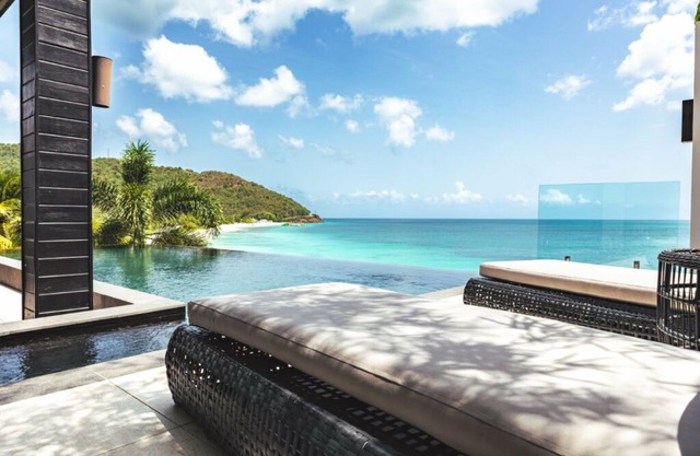Chic Oceanfront 4 Bedroom Villa Perfect for Beachfront Morning Coffee Moments