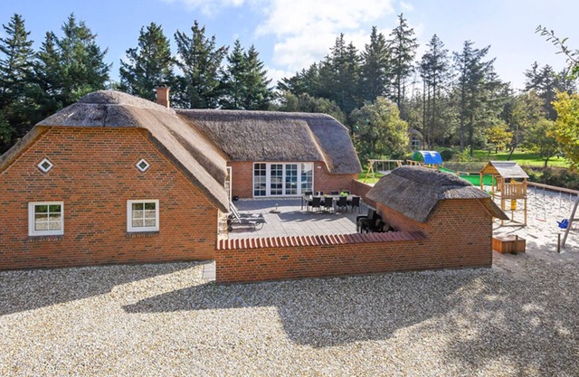 Chic thatched house on a huge natural plot with indoor pool