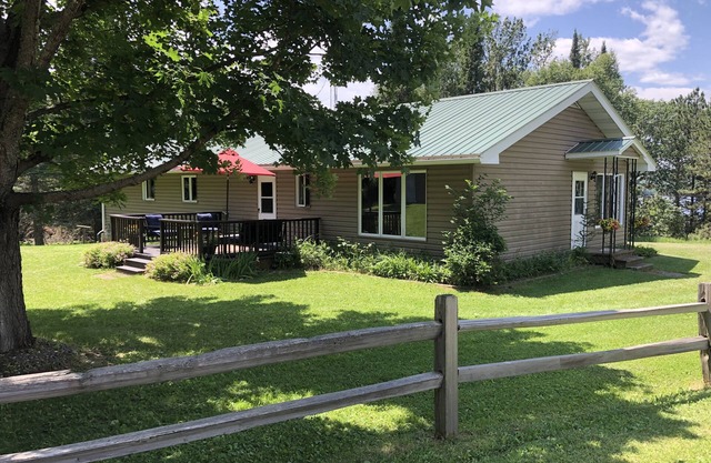 Chicaugon Lake home close to great golf and fishing opportunities.