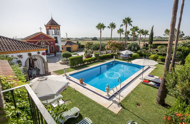 OFERTA NAVIDAD Y ENERO!! CASA DE CAMPO A 25 KM DE SEVILLA,PISCINA, WIFI,A/A