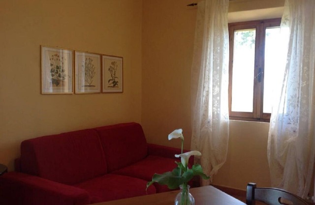 CIPRESSO APARTMENT in CASANOVA farmhouse on hills of Crete Senesi