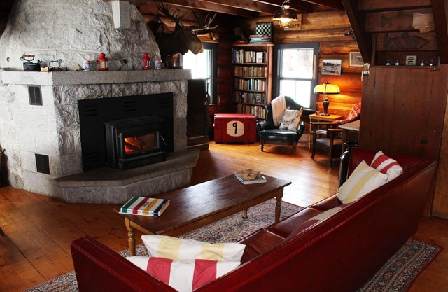 Classic Canadian Log home on a private lake, with acres to explore!