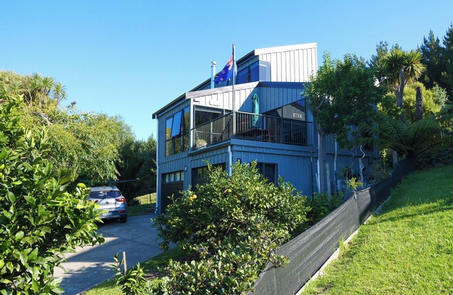 Classic Kiwi Beach Bach – 4 Bedrooms of Laid-Back Charm