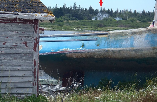 Clásica casa de verano de Nueva Escocia en una playa de arena blanca