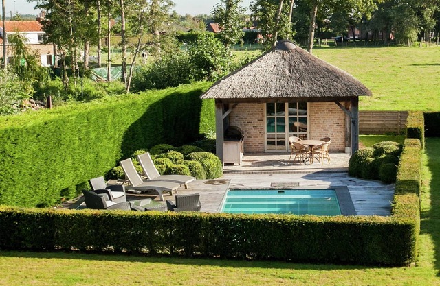 Casa de vacaciones boutique con piscina en Aartrijke