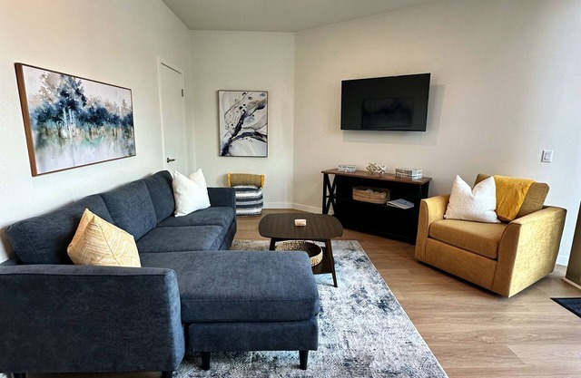Clean, bright, with large exclusive patio, parking, close to airport and beach