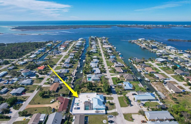 CLEAN,Great Location,Dockage Available,HEATED Pool,3 Units, HUGE Back yard.