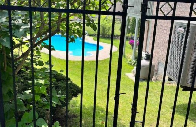 Clean, spacious, poolside entire lower level apt