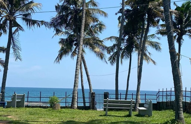 Cliff beach chalet with private beach access near Varkala.