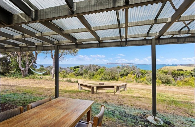 Clifftop Cocoon Swing into Scenic Sea Views
