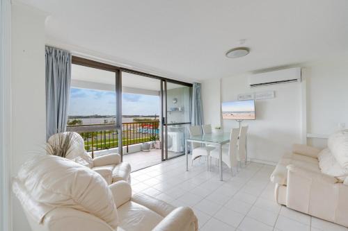 Coastal 2-Bedroom Retreat with Pool & Tennis Court