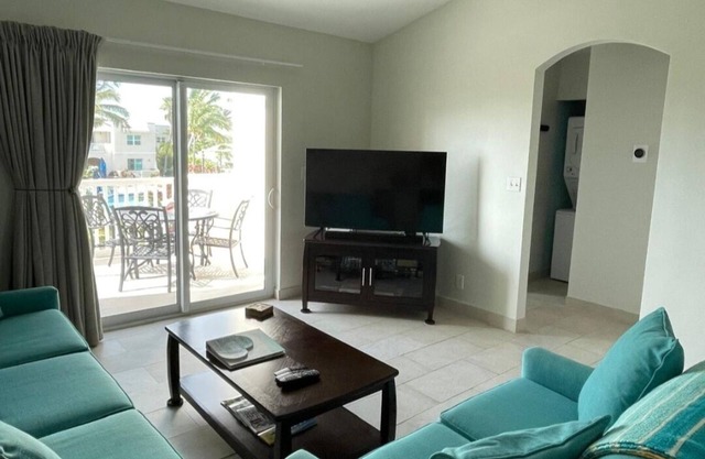 “Coastal Bliss: Stunning 2-Bedroom Condo with breathtaking Beach and Pool Views”