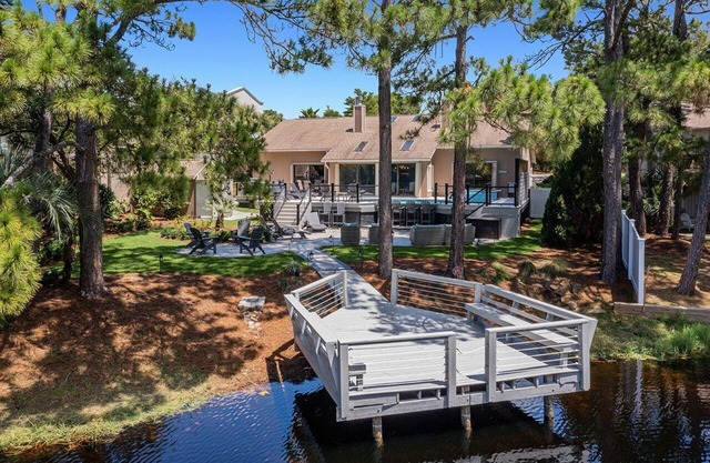 Coastal Soul - Secluded Lakefront Home with Private Pool Area & Golf Cart