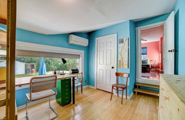 Colorful dog-friendly home near downtown with back patio, streaming, desk, AC