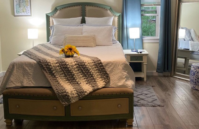 Come relax in this peaceful home with newly renovated master bedroom.