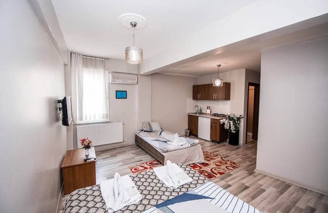 Habitación Triple Confort con Kichenette