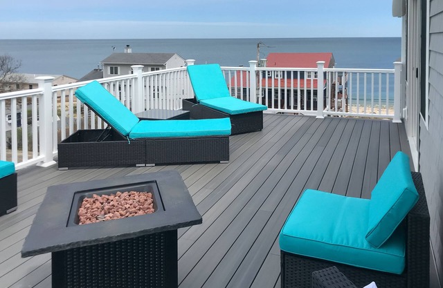 Comfortable home with rooftop deck, beach & water views, W/D, & central AC