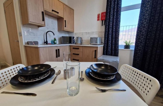 Comfortable Living Space: Flat 2 offers a modern studio apartment