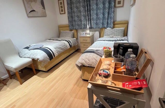Comfortable Twin Bedroom with shared shower room at The Bungalow in Kettering.