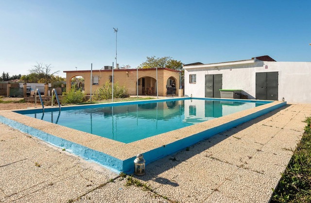 Alojamiento de 3 habitaciones en Sanlucar La Mayor