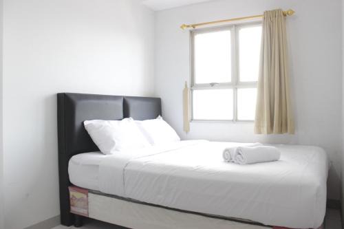 Comfy 2BR Apartment at Mekarwangi Square Cibaduyut By Travelio