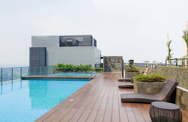 Comfy And Minimalist Studio At Embarcadero Bintaro Apartment