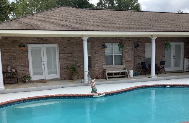 Complete, cozy apartment with laundry, pool and parking just off I-10.