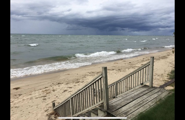 Condo #5 Upper level condo with lovely Lake Huron sunset views .