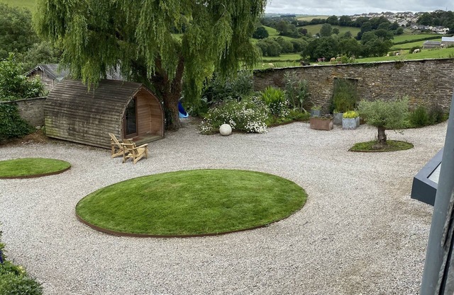 Contemporary cottage nestled in valley with beautiful views.
