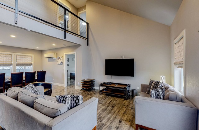 Contemporary, Dog-Friendly Home with a Furnished Deck, Free WiFi, & Game Room
