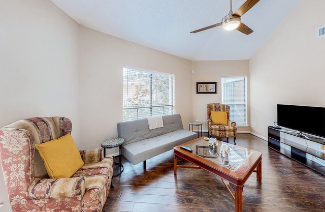 Conveniently located condo with on-site pool, private balcony, AC, & W/D