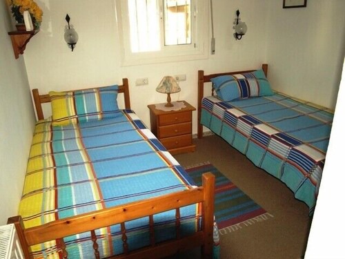 Corner-bungalow with excellent sea view and community pool