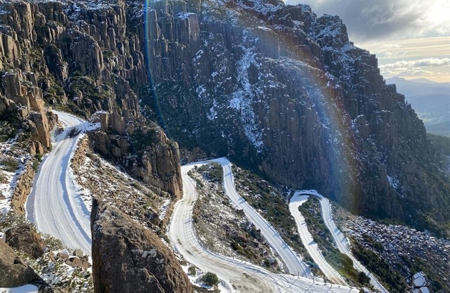 Cosy cabin in historic alpine village, surrounded by Tassie wilderness & iconic road.