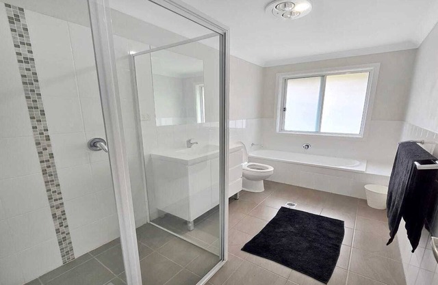 Cosy three bedroom home, two bathrooms and BBQ area!