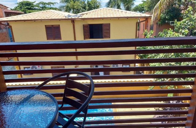 Cotia - Novo Flat com Piscina, 50mts da praia, churrasqueira privativa, ar con, wi-fi, netflix, garagem