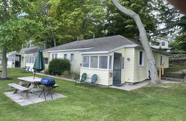 Cottage 2 is a 2 bedroom 25’ from its boat dock & Hamlin Lake