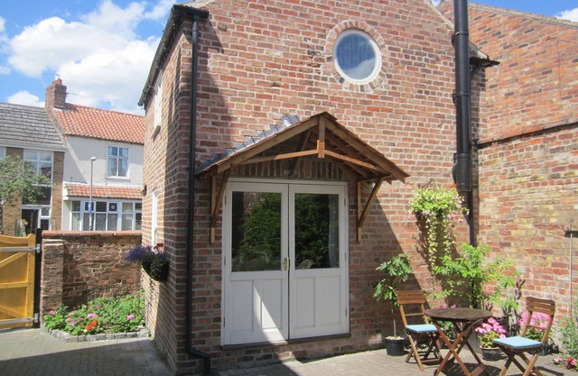 Cottage en Pocklington, cerca de York, con estufa de leña, wifi y estacionamiento en la calle