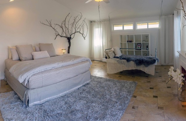 Cottage offers a sectional sofa, chef's kitchen and open floor plan.