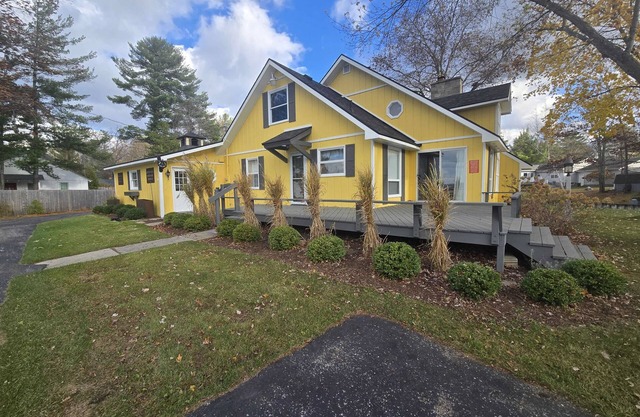 Cottage on the canal to Burt Lake with large patio and space for boat