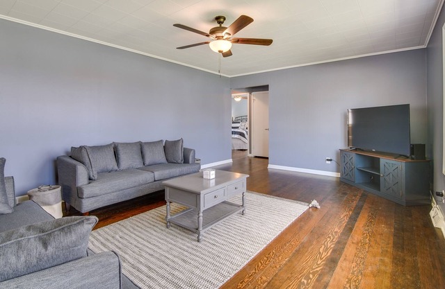 Cottage w/ Sunroom & Fire Pit, Walk to Lake!