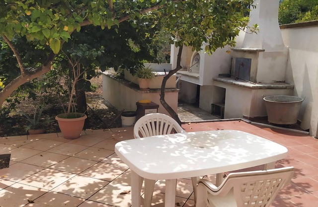 Country house with terrace in the shade of lemon trees