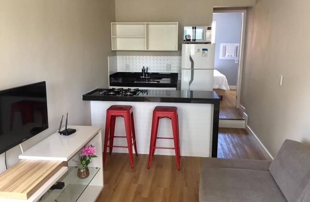 Acogedor apartamento de 1 dormitorio con aire acondicionado en Jardim Camburi