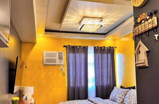 Cozy 1-bedroom condo with AC, WiFi in serene Silang Kitchen mini karaoke.