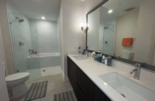 Cozy 2 bedroom apartment that feels like home with a rooftop heated jacuzzi.