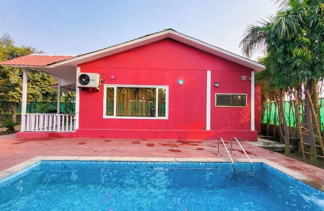 Cozy 2-bedroom Chalet with Lawn and Pool in Marvelous Greater Noida with WiFi,AC