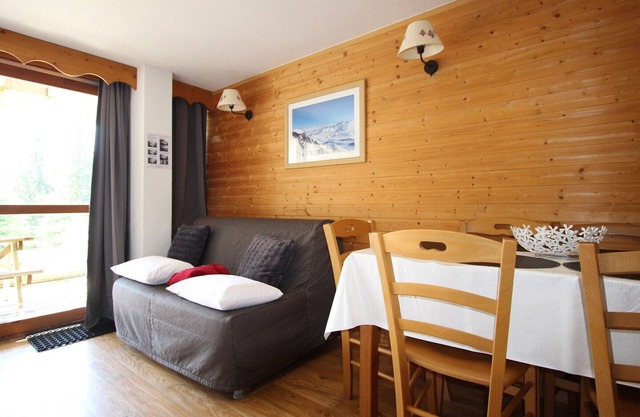 Apartamento de 2 habitaciones y cabina, terraza sur, pistas y comercios cercanos