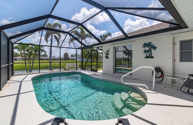 Cozy 3BR, 2BA canal-front home with private pool and serene views. Just 20 minutes from the beach—your perfect Florida escape!