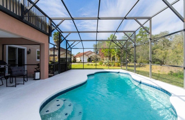Cozy 5Bd w/ Pool Single Family Close to Disney 106
