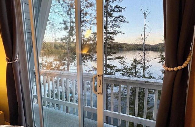 Cozy A-Frame chalet on the beautiful Kennisis Lake. Family and Pet Friendly!