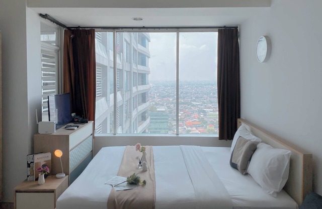 Cozy and Best Deal Studio at Grand Kamala Lagoon Apartment